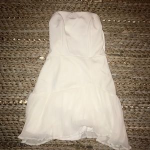 White mini dress with lace up back